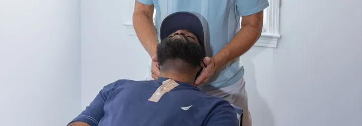 Chiropractor Mobile AL Donald Ellis Adjusting Auto Injury Patient