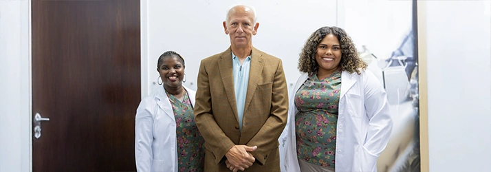 Chiropractor Donald Ellis With Team Members