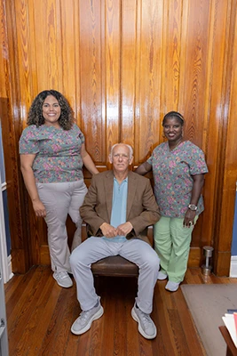 Dr. Donald Ellis posing with his team